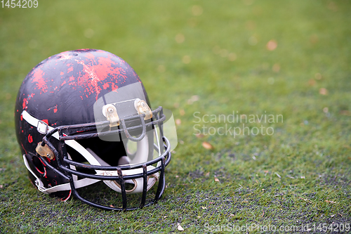 Image of black american football helmet