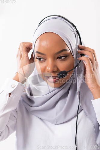 Image of african customer representative business woman with phone headse