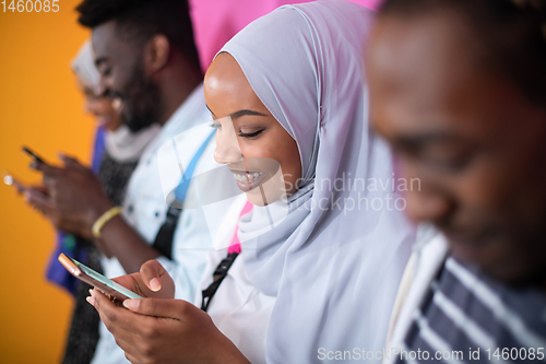Image of african students group using smart phones