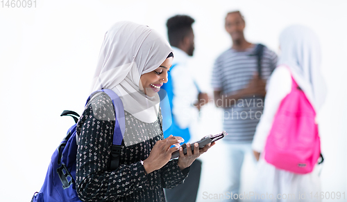 Image of african female student with group of friends