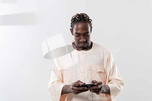 Image of african man using smartphone