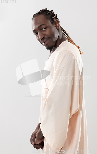 Image of handsome african black man in traditional  clothes