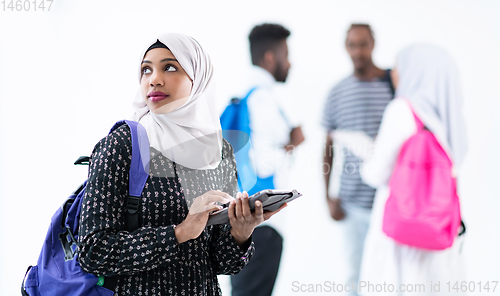 Image of african female student with group of friends