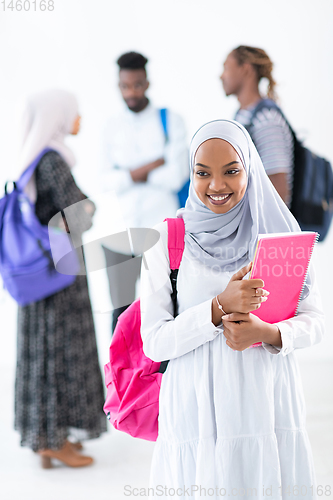 Image of african female student with group of friends