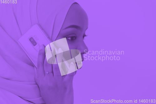 Image of african business woman using smartphone