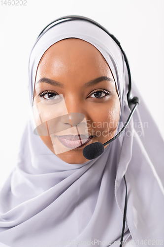 Image of african customer representative business woman with phone headse