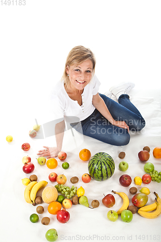 Image of Fruits and blond cute woman