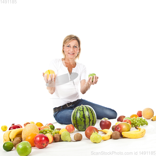 Image of Fruits and blond cute woman