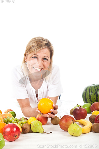 Image of Fruits and blond cute woman