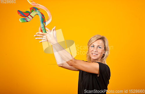 Image of woman posing with a boomerang