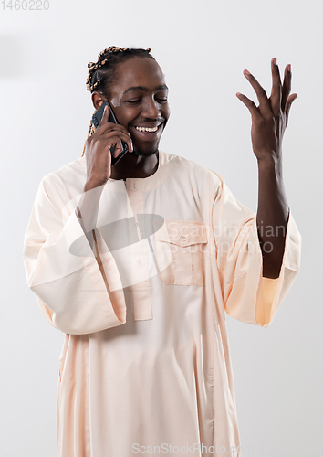 Image of african man using smartphone