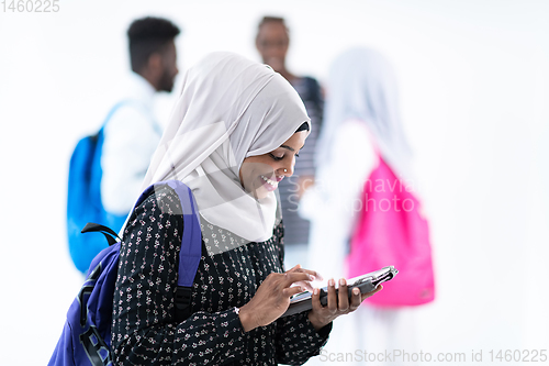 Image of african female student with group of friends