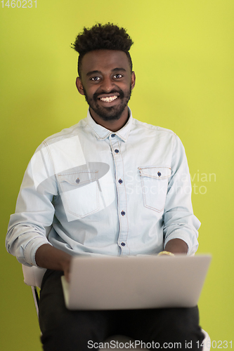 Image of African student using laptop computer