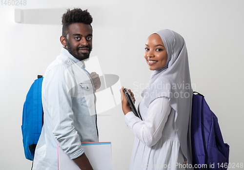 Image of african students couple walking
