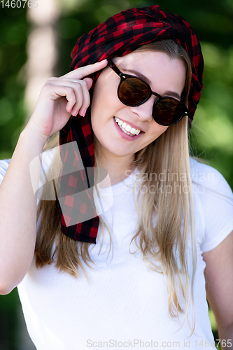 Image of portrait of beautiful girl in nature