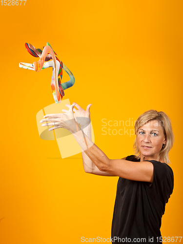 Image of woman posing with a boomerang