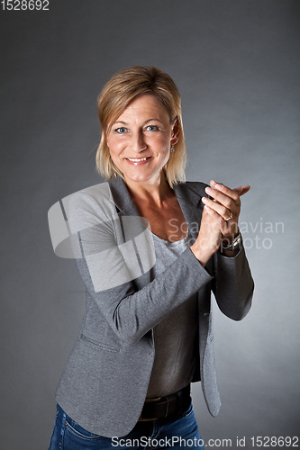 Image of woman portrait clapping hands