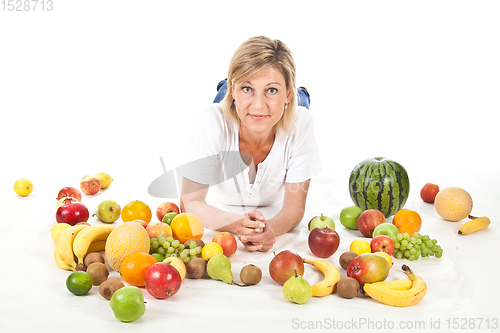 Image of Fruits and blond cute woman