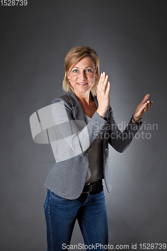 Image of woman portrait clapping hands