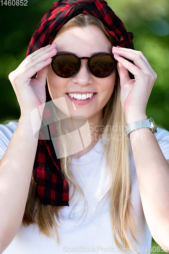 Image of portrait of beautiful girl in nature