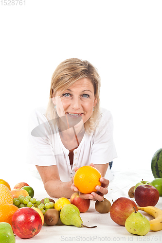 Image of Fruits and blond cute woman