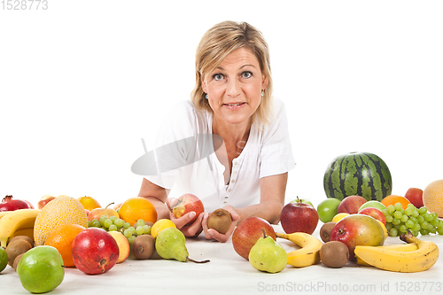 Image of Fruits and blond cute woman