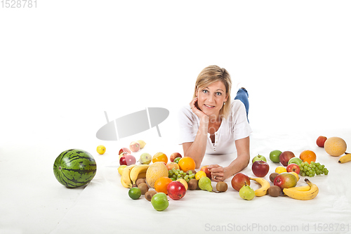 Image of Fruits and blond cute woman