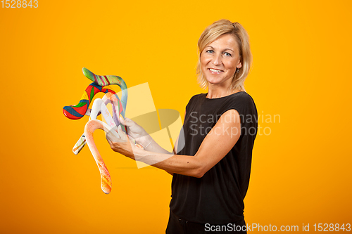 Image of woman posing with a boomerang