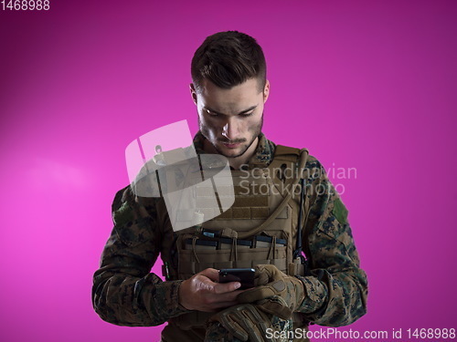 Image of soldier using smartphone