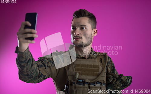 Image of soldier using smartphone