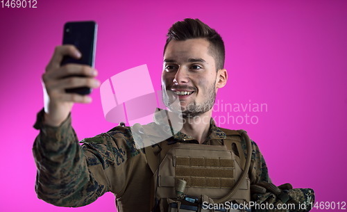 Image of soldier using smartphone