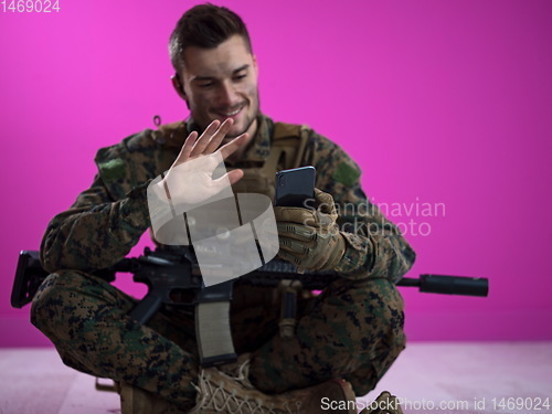 Image of soldier using smartphone