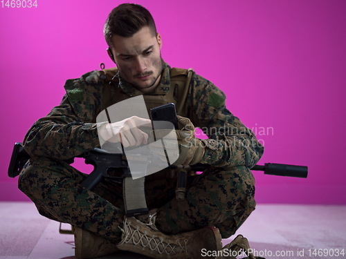 Image of soldier using smartphone