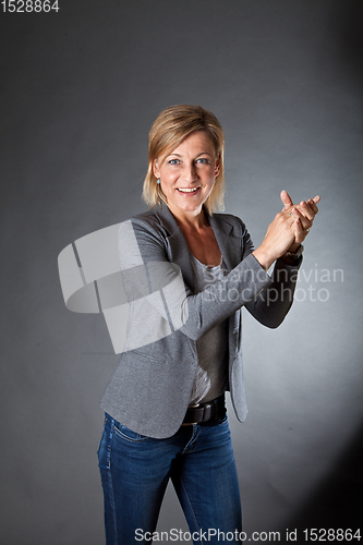 Image of woman portrait clapping hands