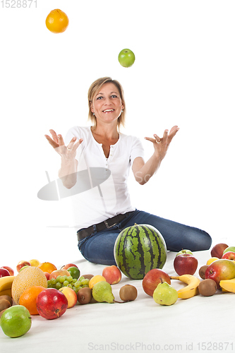 Image of Fruits and blond cute woman