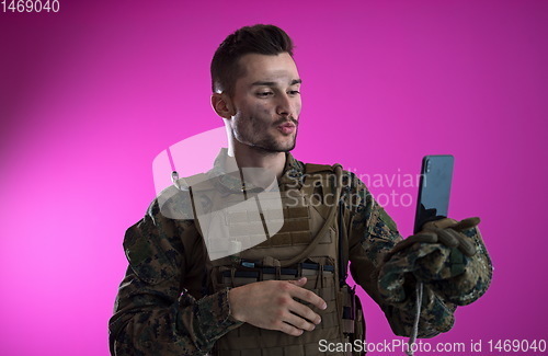 Image of soldier using smartphone