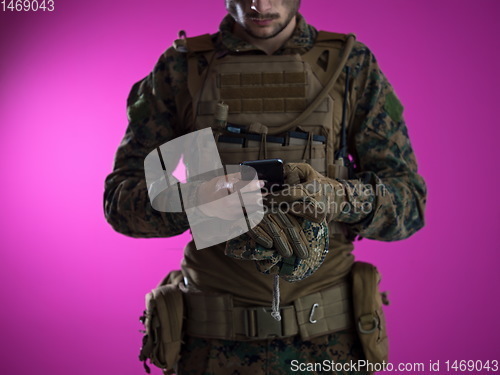 Image of soldier using smartphone