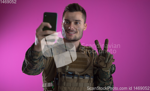 Image of soldier using smartphone