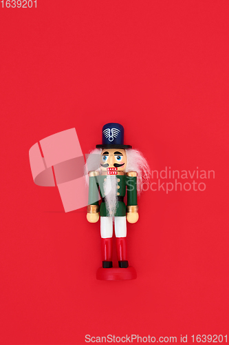 Image of Nutcracker Toy Soldier on Red Background.