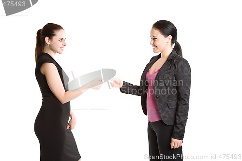 Image of Two businesswomen and business card