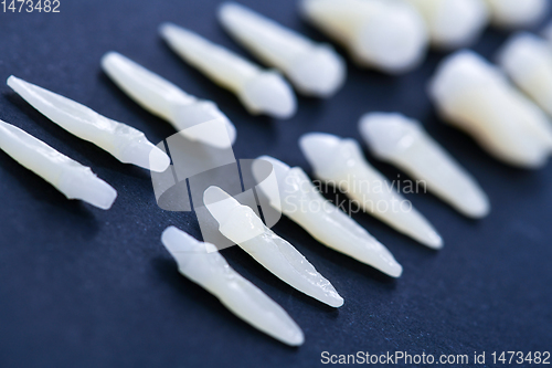 Image of White teeth on blue background