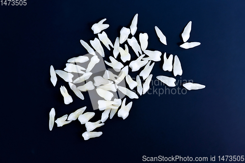 Image of White teeth on blue background