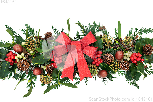 Image of Red Glitter Bow with Holly and Natural Winter Greenery