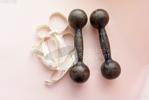 Image of Black Drumbell on Floor Fitness Sports