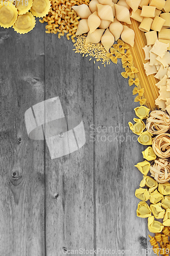 Image of Pasta Collection on Rustic Wood Background