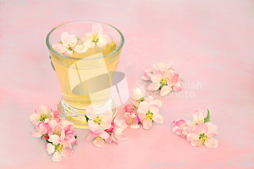 Image of Natural Remedy for Skincare with Apple Blossom Flowers