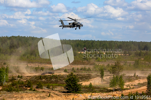 Image of Fighting helicopter in military training Saber Strike in Latvia.