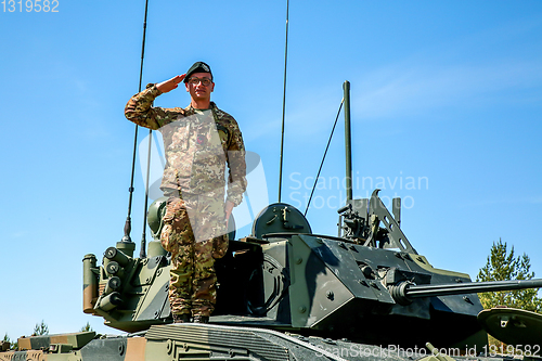 Image of Soldier on tank in military training Saber Strike in Latvia.