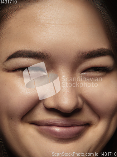 Image of Close up portrait of young emotional woman