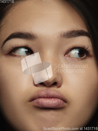 Image of Close up portrait of young emotional woman